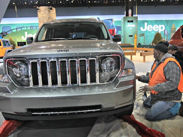 CHICAGO, IL - FEBRUARY 07: Darrell Miller prepares a Jeep Liberty for display at the Chica