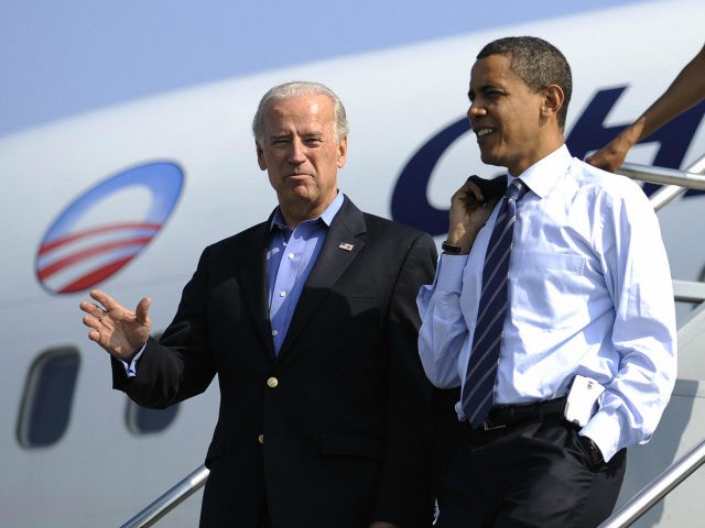 US Democratic presidential candidate Illinois Senator Barack Obama and his running mate Joe Biden disembark from Obama's campaign plane at Detroit Metropolitan International airport in Detroit, Michigan, September 28, 2008. AFP PHOTO/Emmanuel Dunand (Photo credit should read EMMANUEL DUNAND/AFP via Getty Images)