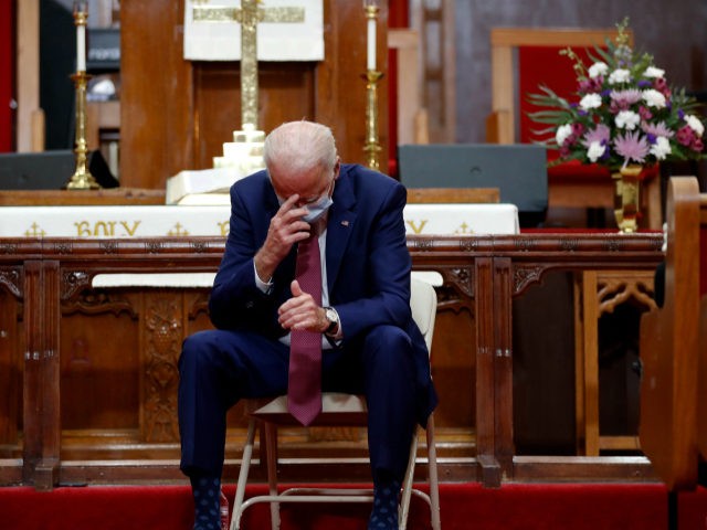 Democratic presidential candidate, former Vice President Joe Biden bows his head and prays as he visits Bethel AME Church in Wilmington, Del., Monday, June 1, 2020. (AP Photo/Andrew Harnik)