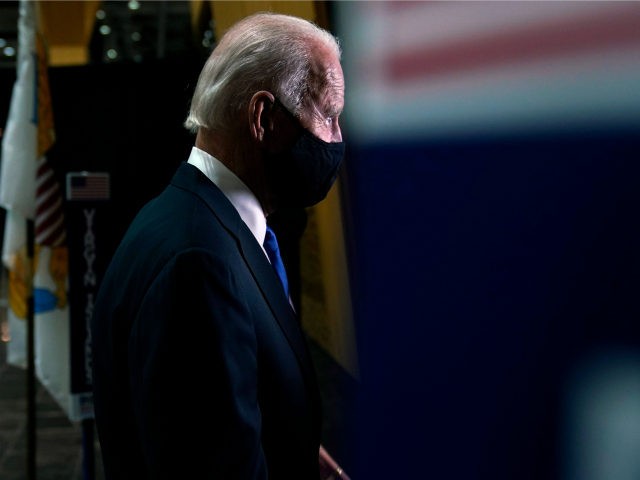 Democratic presidential candidate former Vice President Joe Biden walks to an outdoor stage during the fourth day of the Democratic National Convention, Thursday, Aug. 20, 2020, at the Chase Center in Wilmington, Del. (AP Photo/Andrew Harnik)