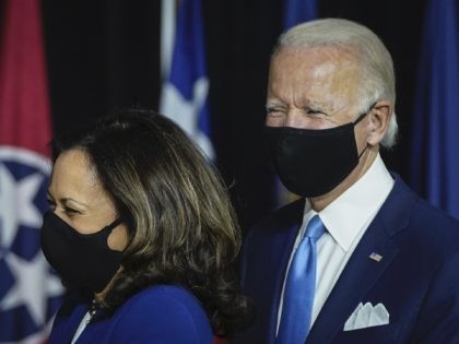 WILMINGTON, DE - AUGUST 12: Presumptive Democratic presidential nominee former Vice President Joe Biden and his running mate Sen. Kamala Harris (D-CA) arrive to deliver remarks at the Alexis Dupont High School on August 12, 2020 in Wilmington, Delaware. Harris is the first Black woman and the first person of …