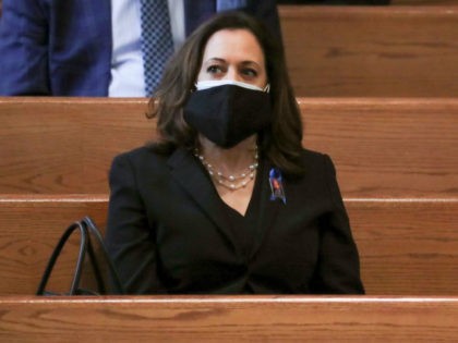 Sen. Kamala Harris waits for the program to start at the funeral service for the late Rep.