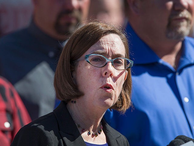 ROSEBURG, OR - OCTOBER 02: Oregon governor Kate Brown speaks to the press about the mass shooting at Umpqua Community College on October 2, 2015 in Roseburg, Oregon. Yesterday 26-year-old Chris Harper Mercer went on a shooting rampage at the campus, killing 9 people and wounding another seven before he …