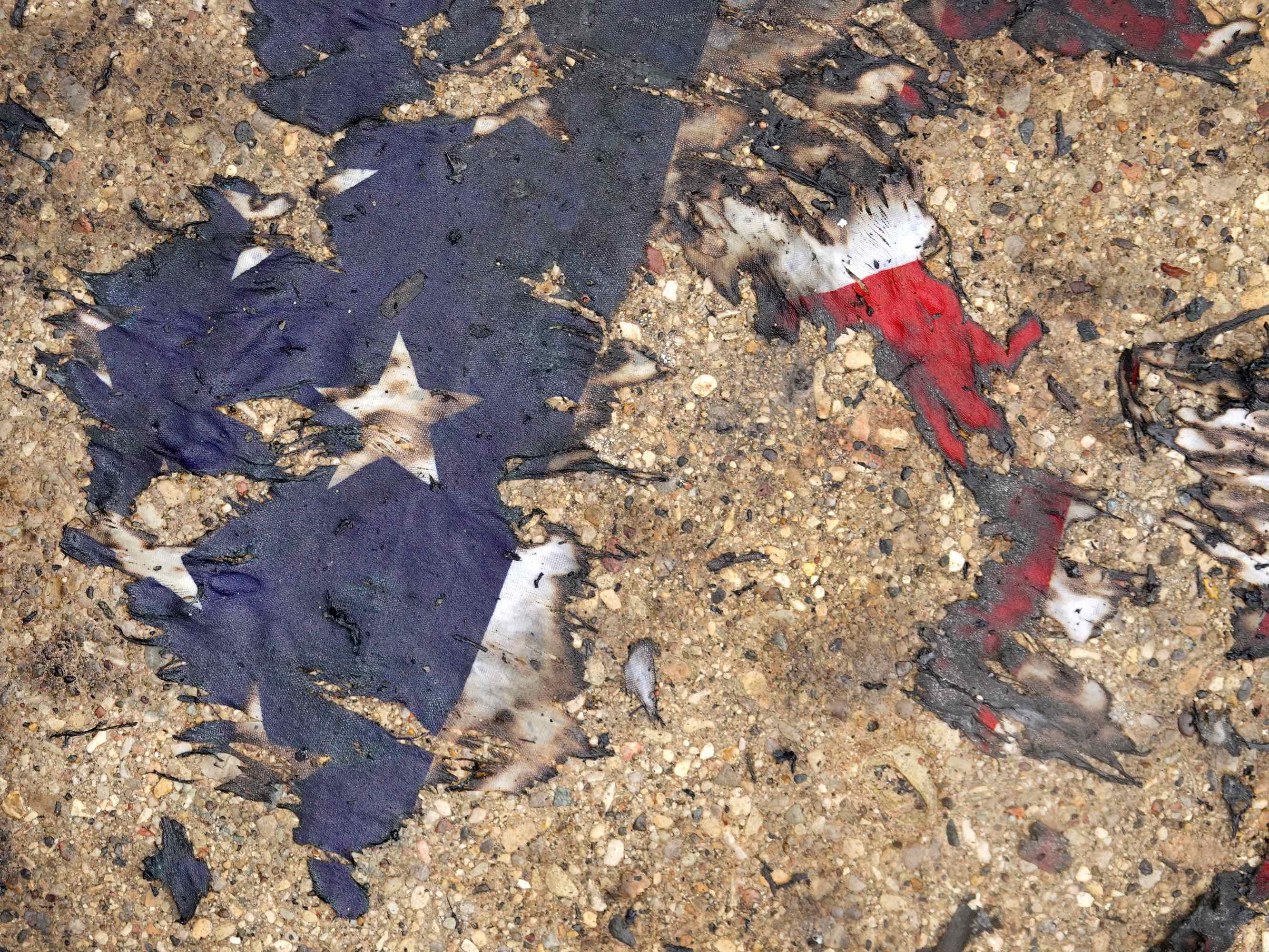 Kenosha burned American flag (Scott Olson / Getty)