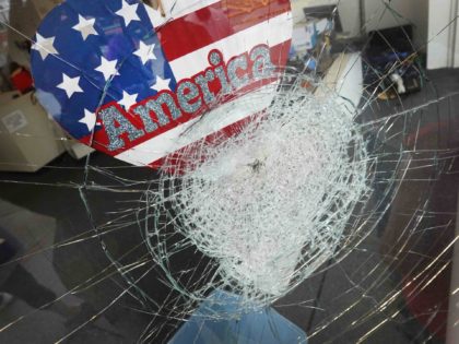 Kenosha shattered window (Scott Olson / Getty)