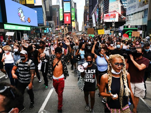 NEW YORK, NEW YORK - AUGUST 24: Protesters with the Black Lives Matter (BLM) movement marc