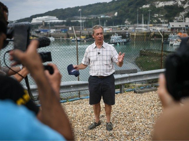 DOVER, ENGLAND - AUGUST 12: Brexit Party leader Nigel Farage speaks to supporters and media on August 12, 2020 in Dover, England. Favourable weather conditions in recent weeks have led to a rise in people attempting to cross the channel, with more than 200 people arriving on the Kent coast …