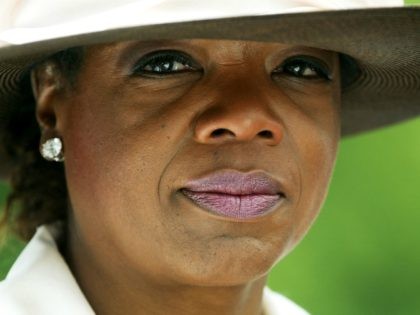 WHEATON, MD - JUNE 28: Talk show host Oprah Winfrey is seen after attending a funeral mass for Mattie Stepanek June 28, 2004 outside the St. Catherine Laboure Catholic Church in Wheaton, Maryland. Mattie Stepanek, a best-selling poet and an advocate for victims with muscular dystrophy, died of the disease …