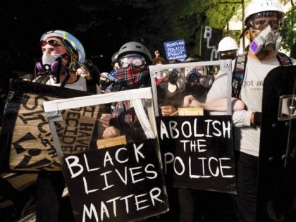 Portland riot (Noah Berger / Associated Press)