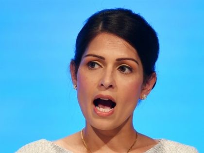 MANCHESTER, ENGLAND - OCTOBER 01: Home Secretary, Priti Patel addresses the delegates on the third day of the Conservative Party Conference at Manchester Central on October 1, 2019 in Manchester, England. Despite Parliament voting against a government motion to award a recess, Conservative Party Conference still goes ahead. Parliament will …