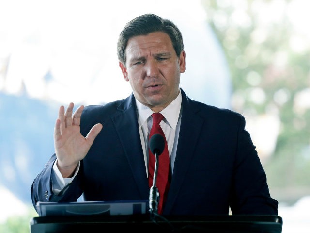 Florida Gov. Ron DeSantis speaks at a news conference at Universal Studios Wednesday, June