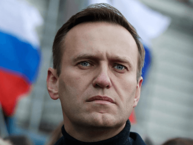 In this file photo taken on Saturday, Feb. 29, 2020, Russian opposition activist Alexei Navalny takes part in a march in memory of opposition leader Boris Nemtsov in Moscow, Russia. As Russia's most determined and durable opposition figure, Alexei Navalny has employed an astute understanding of social media and an …