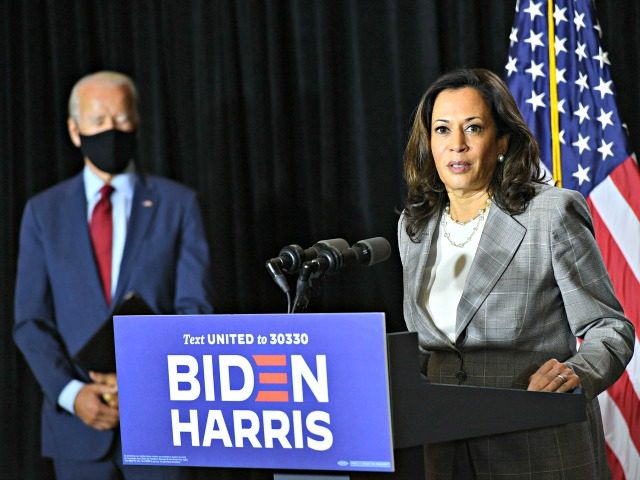 Democratic presidential nominee, former US Vice President Joe Biden (L), and vice presiden