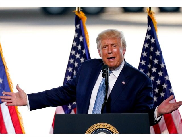 President Donald Trump speaks to a crowd of supporters at the Yuma International Airport T