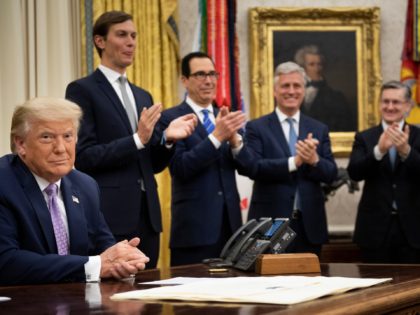 (L-R, rear) Senior Advisor Jared Kushner, US Secretary of the Treasury Steven Mnuchin and