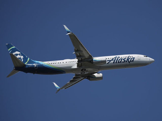 NEW YORK - AUGUST 24 : A Boeing 737-990 (ER) operated by Alaska Airlines takes off from JF