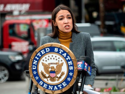 Democratic Congresswoman from New York Alexandria Ocasio-Cortez speaks during a press conference in the Corona neighbourhood of Queens on April 14, 2020 in New York City. - Senate Minority Leader Chuck Schumer and Democratic Rep. Alexandria Ocasio-Cortez hold a press conference amid the coronavirus pandemic to call on the Federal …