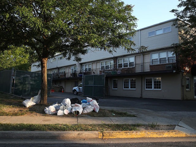 ESSEX, MARYLAND - JULY 30: Trash lays on the ground at the Cove Village apartment complex