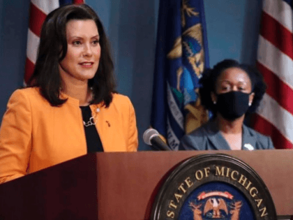 In this Aug. 19, 2020, photo provided by the Michigan Office of the Governor, Michigan Gov. Gretchen Whitmer addresses the state during a speech in Lansing, Mich. The Michigan appeals court says Democratic Gov. Whitmer's emergency declarations and orders to curb the coronavirus clearly fall within the scope of her …