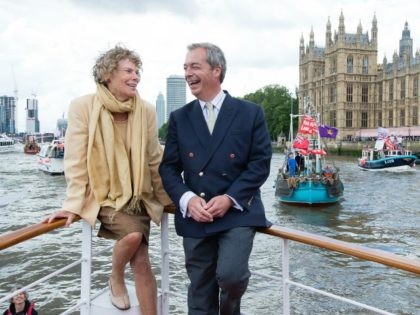 LONDON, ENGLAND - JUNE 15: (L-R) Kate Hoey and Nigel Farage, leader of the UK Independence Party, show their support for the 'Leave' campaign for the upcoming EU Referendum aboard a boat on the River Thames on June 15, 2016 in London, England. Nigel Farage, leader of UKIP, is campaigning …