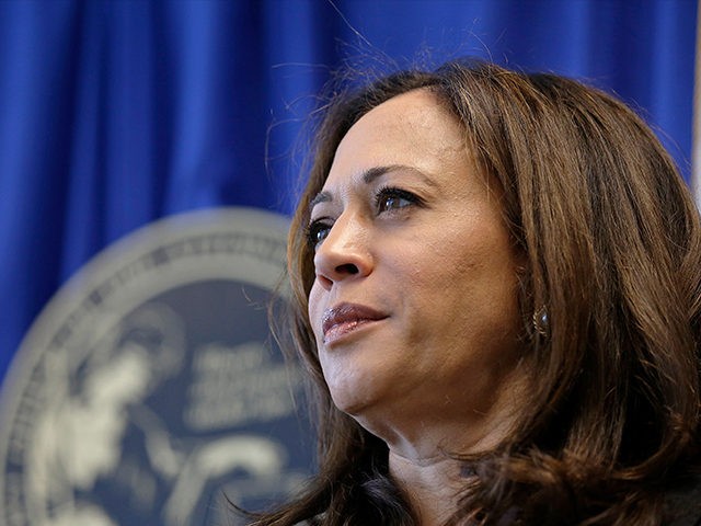 California Attorney General Kamala Harris listens to questions about a settlement with Volkswagen during a news conference Tuesday, June 28, 2016, in San Francisco. Volkswagen will spend up to $15.3 billion to settle consumer lawsuits and government allegations that it cheated on emissions tests in what lawyers are calling the …