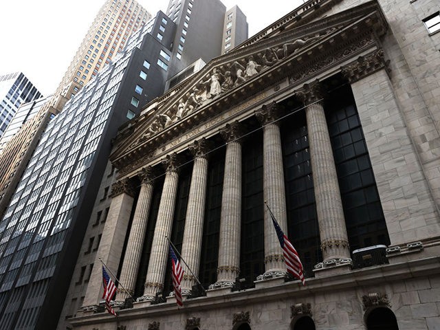 NEW YORK, NEW YORK - JULY 23: American flags are on display on the New York Stock Exchange (NYSE) on July 23, 2020 in New York City. On Wednesday July 22, the market had its best day in 6 weeks. (Photo by Michael M. Santiago/Getty Images)