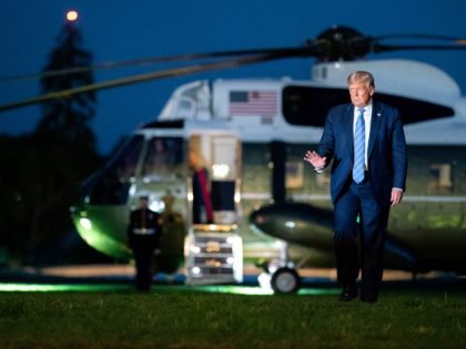 President Donald J. Trump waves after disembarking Marine One on the South Lawn of the Whi