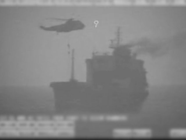 In this image made from video released by the U.S. military's Central Command, Iranian commandos fast-rope down from a helicopter onto the MV Wila oil tanker in the Gulf of Oman off the coast of the United Arab Emirates on Wednesday, Aug. 12, 2020. The Iranian navy boarded and briefly …