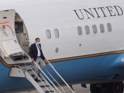US Health Secretary Alex Azar walks out of a plane as he arrives at the Sungshan Airport in Taipei on August 9, 2020. - Azar, a senior member of US President Donald Trump's administration, landed in Taiwan on August 8, 2020 for Washington's highest level visit since switching diplomatic recognition …