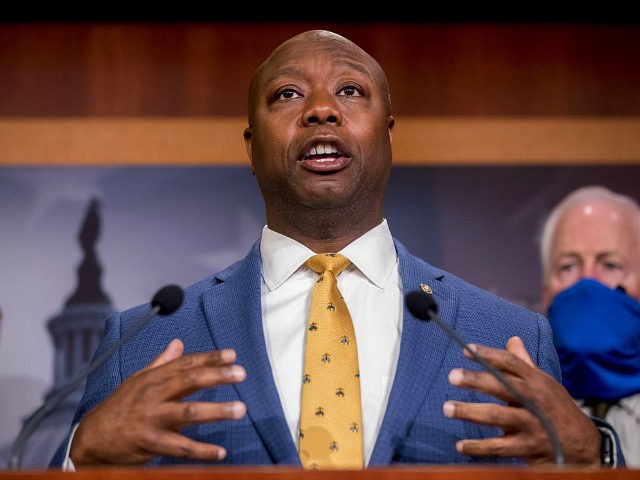 Sen. Tim Scott, R-S.C., accompanied by Republican senators speaks at a news conference to announce a Republican police reform bill on Capitol Hill, Wednesday, June 17, 2020, in Washington. (AP Photo/Andrew Harnik)
