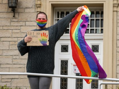 EDINBURGH, SCOTLAND - AUGUST 10: Members of the Scottish Polish community demonstrate outside the Polish Consulate to protest the arrest of a transgender activist who had carried out acts of civil disobedience against rising homophobia in Poland on August 10, 2020 in Edinburgh,Scotland. (Photo by Jeff J Mitchell/Getty Images)