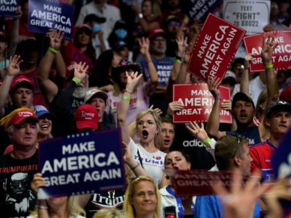 Supporters of President Donald Trump cheer as Vice President Mike Pence speaks during a campaign rally at the BOK Center, Saturday, June 20, 2020, in Tulsa, Okla. (AP Photo/Evan Vucci)