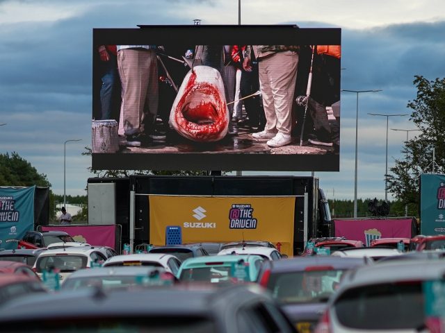 NEWCASTLE UPON TYNE, ENGLAND - AUGUST 05: Cars park up to watch a showing of Jaws during a