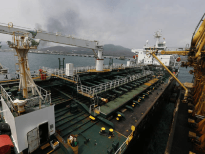 In this May 25, 2020 file photo, the Iranian oil tanker Fortune is anchored at the dock of the El Palito refinery near Puerto Cabello, Venezuela. U.S. officials said Thursday, Aug. 13, 2020, that the Trump administration has seized the cargo of four tankers it was targeting for transporting Iranian …