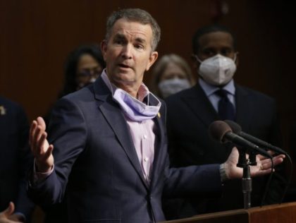 In this June 4, 2020, file photo Virginia Gov. Ralph Northam speaks during a news conference in Richmond, Va. Virginia has rolled out a smartphone app to automatically notify people if they might have been exposed to the coronavirus. It's the first U.S. state to use new pandemic technology created …