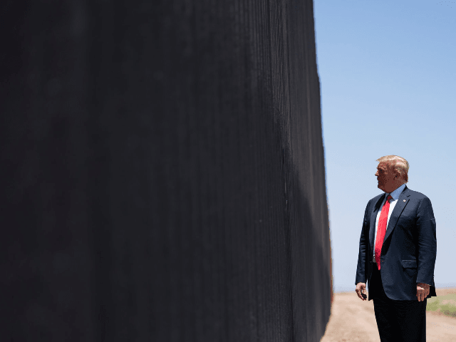 President Donald Trump tours a section of the border wall, Tuesday, June 23, 2020, in San Luis, Ariz. (AP Photo/Evan Vucci)