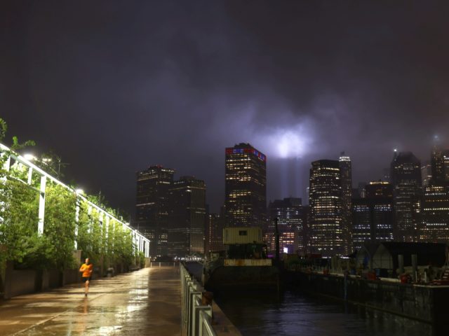 NEW YORK, NEW YORK - SEPTEMBER 10: A man jogs in Brooklyn Bridge Park as the 9/11 Tribute