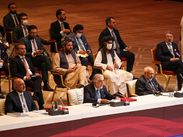 Abdullah Abdullah (C), Chairman of Afghanistan's High Council for National Reconciliation,