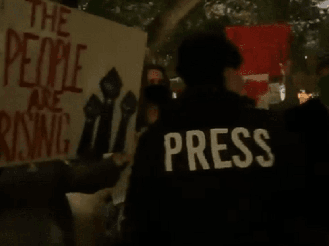 Austin, Texas, independent journalist mobbed, chased out of protest rally. (Photo: Twitter