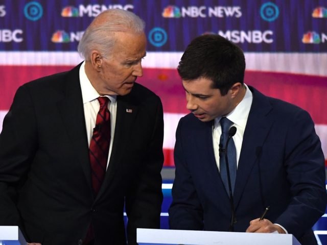 Democratic presidential hopefuls former Vice President Joe Biden (L) and former Mayor of South Bend, Indiana, Pete Buttigieg speak during a break in the ninth Democratic primary debate of the 2020 presidential campaign season co-hosted by NBC News, MSNBC, Noticias Telemundo and The Nevada Independent at the Paris Theater in …
