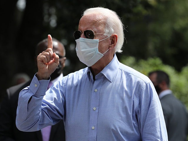LANCASTER, PENNSYLVANIA - SEPTEMBER 07: Wearing a face mask to reduce the risk from the coronavirus, Democratic presidential nominee Joe Biden talks to neighbors who gathered outside his meeting with veterans and union leaders on Labor Day September 07, 2020 in Lancaster, Pennsylvania. Biden is scheduled to travel later to …