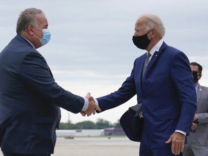 Biden shaking hands (Carolyn Kaster / Associated Press)