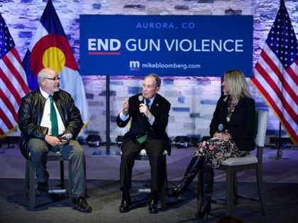 AURORA, CO - DECEMBER 05: Democratic presidential candidate, former New York City Mayor Michael Bloomberg (C) sits with Colorado state representative Tom Sullivan (L) and moderator and Everytown for Gun Safety senior managing director Debbie Weir during an event to introduce Bloomberg's gun safety policy agenda at the Heritage Christian …
