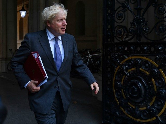 Britain's Prime Minister Boris Johnson returns to Downing Street following a cabinet meeti