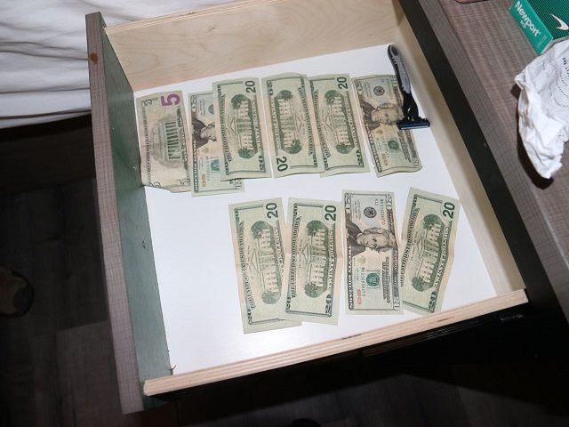 Cash box found by detectives in alleged sex-trafficking hotel room. (Photo: U.S. Attorney