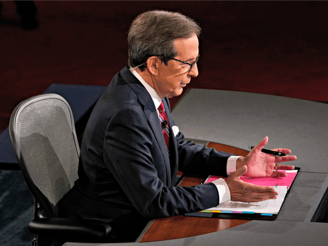 CLEVELAND, OHIO - SEPTEMBER 29: Moderator Chris Wallace of Fox News talks before the first