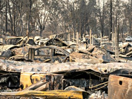 PHOENIX, OR - SEPTEMBER 10: Damaged homes and cars are seen in a mobile home park destroyed by fire on September 10, 2020 in Phoenix, Oregon. Hundreds of homes in the town have been lost due to wildfire. (Photo by David Ryder/Getty Images)