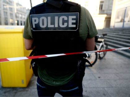 French police patrol near a bank in the port city of Le Havre, northwestern France, on Aug