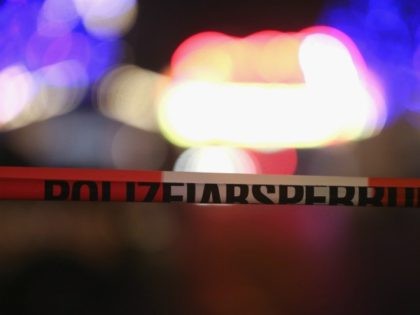 Police tape cordons off the area after an explosive was found at Christmas market in Potsdam, near Berlin, Germany on December 1, 2017. - German police were investigating a possible explosive containing nails close to a Christmas market in Potsdam, reviving fears of a repeat of last year's terror attack …