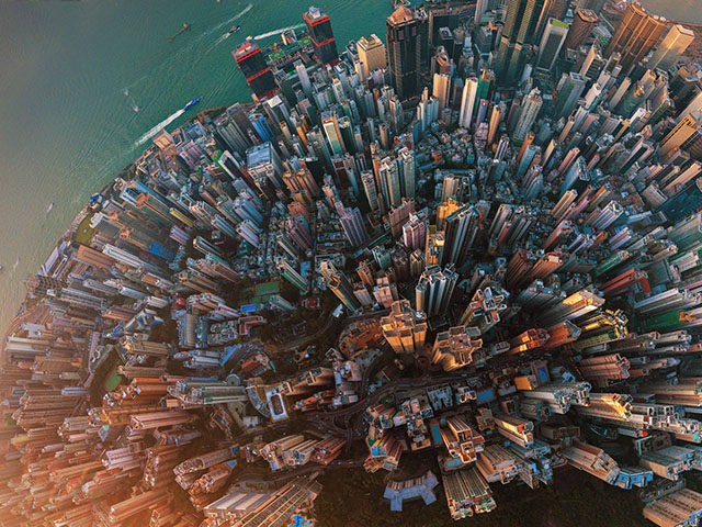 Little planet. Aerial view of Hong Kong Downtown. Financial district and business centers